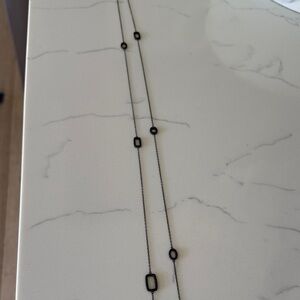 Sleek Black Necklace with Geometric Accents